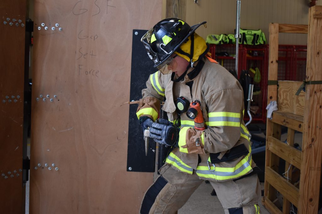 Firefighters Train For Emergency Entry Spring Fire Department
